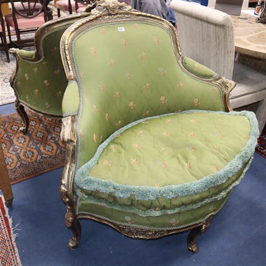 A pair of Italian giltwood armchairs